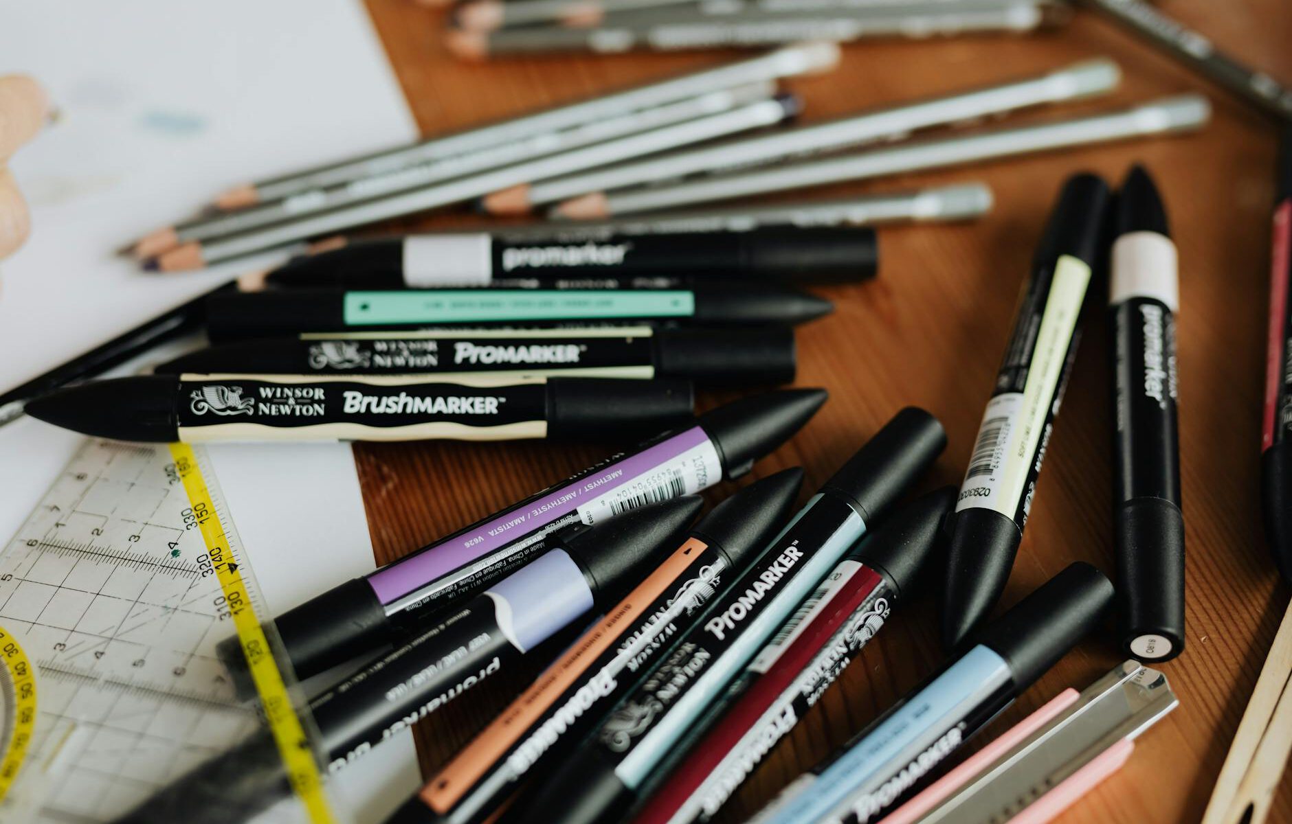 school supplies and marker pens on table